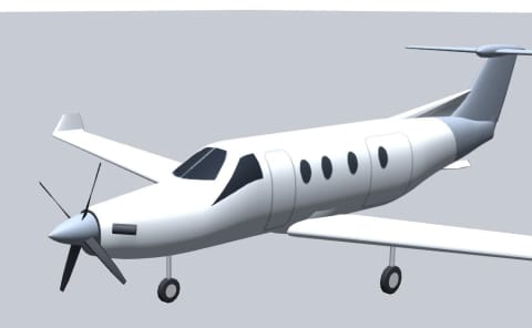 The first PC-12 model from the front left: oval cabin windows, a single dark windscreen and a four-bladed propeller