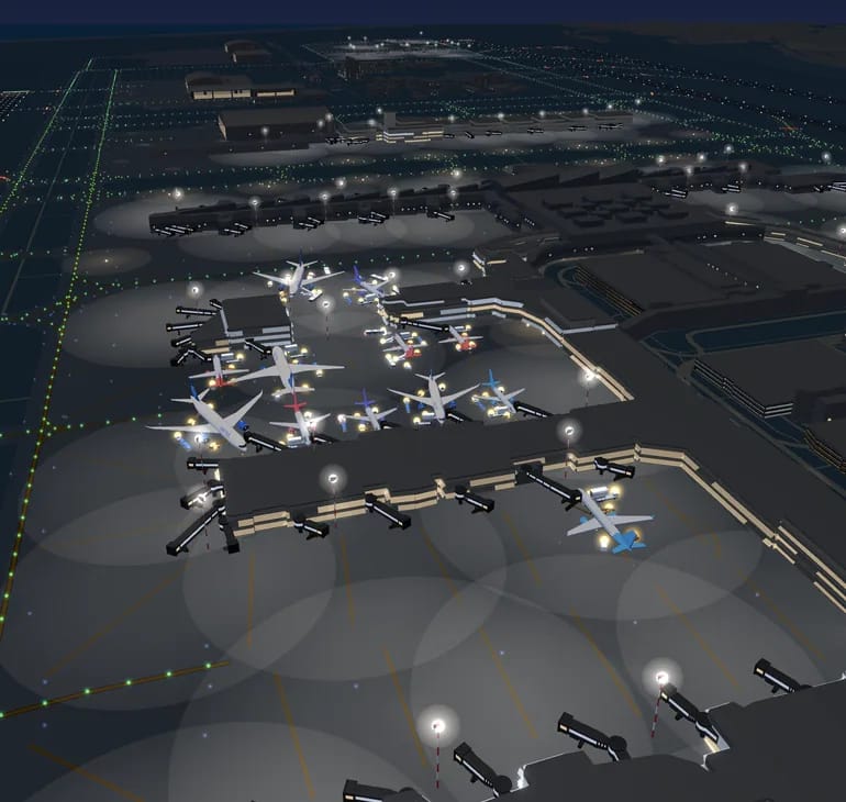 Los Angeles airport at night in 3D with vehicle beacons on the apron